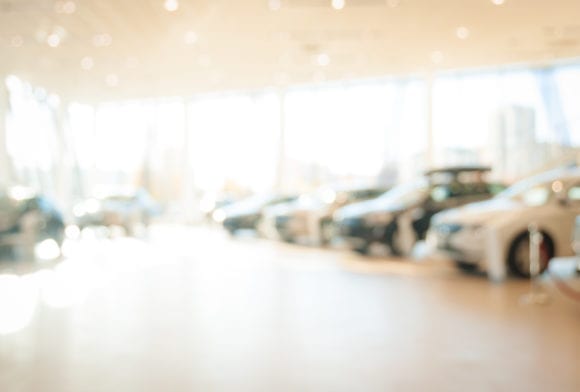 new cars in a dealership showroom